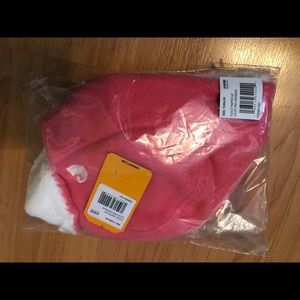 Brand new in bag Carhartt trapper hat pink with faux fur.